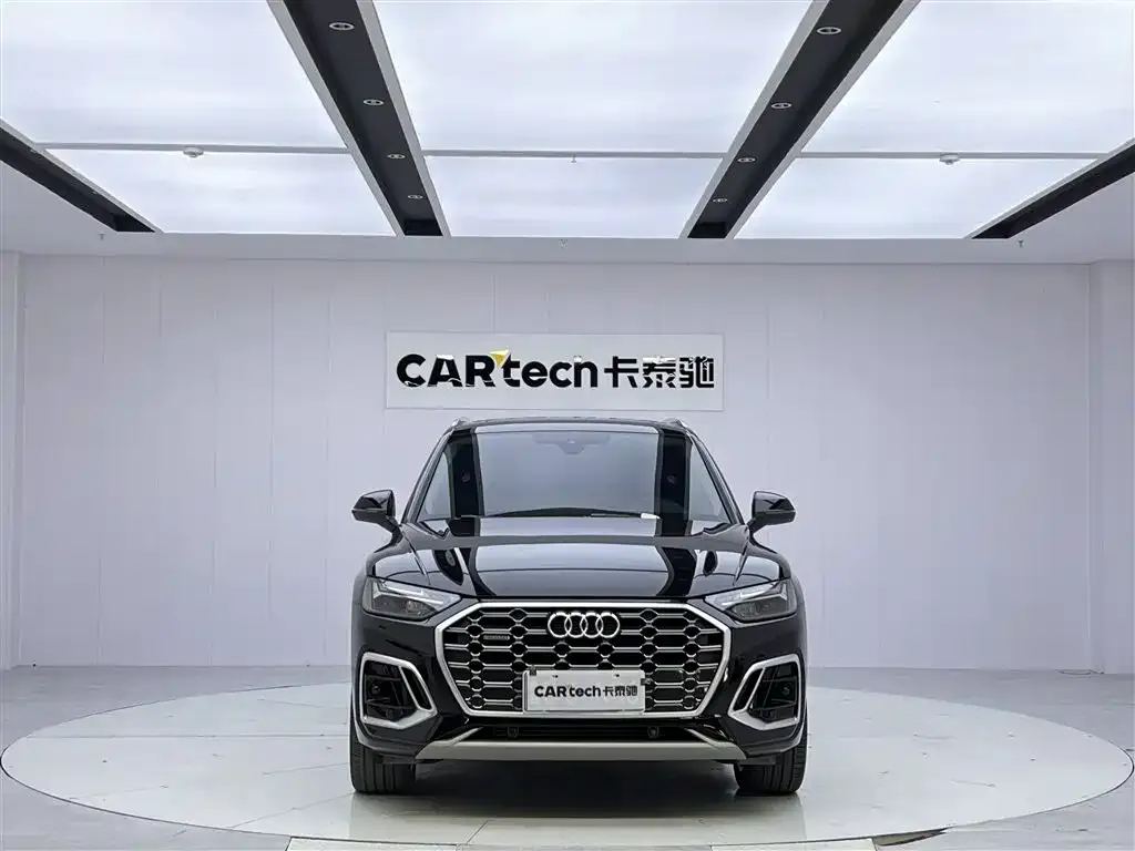 Audi Q5L — фото 8