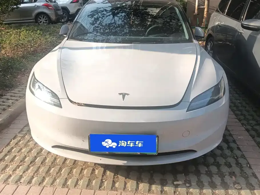 Tesla Model 3 — фото 7