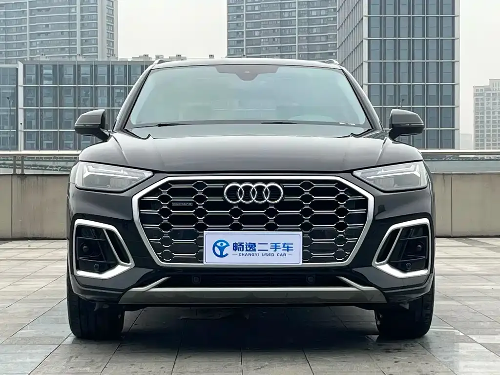 Audi Q5L — фото 10
