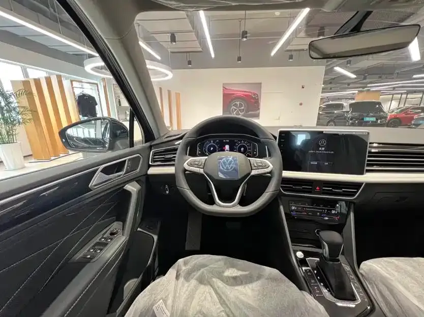 Volkswagen Tiguan L New Energy — фото 10