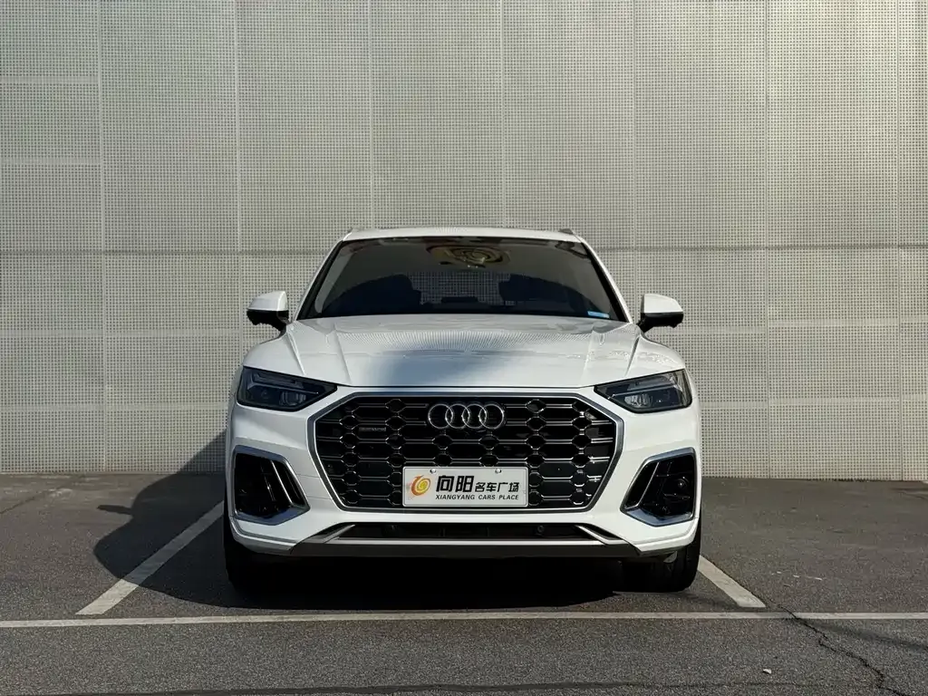 Audi Q5L — фото 5