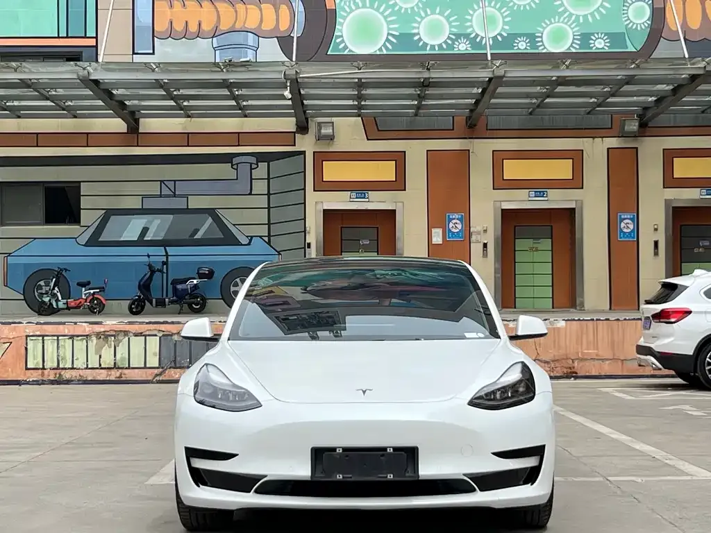 Tesla Model 3 — фото 7