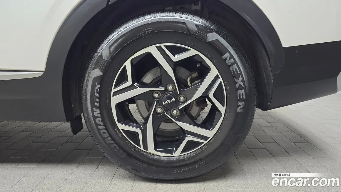 Kia Sportage — фото 7
