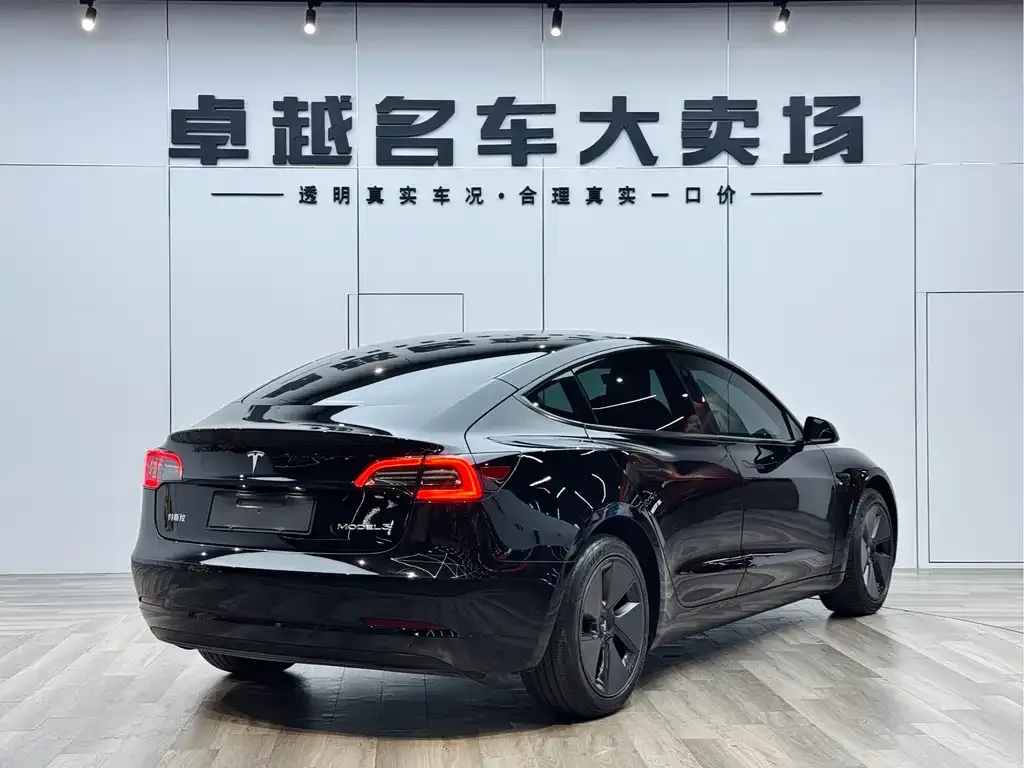 Tesla Model 3 — фото 5
