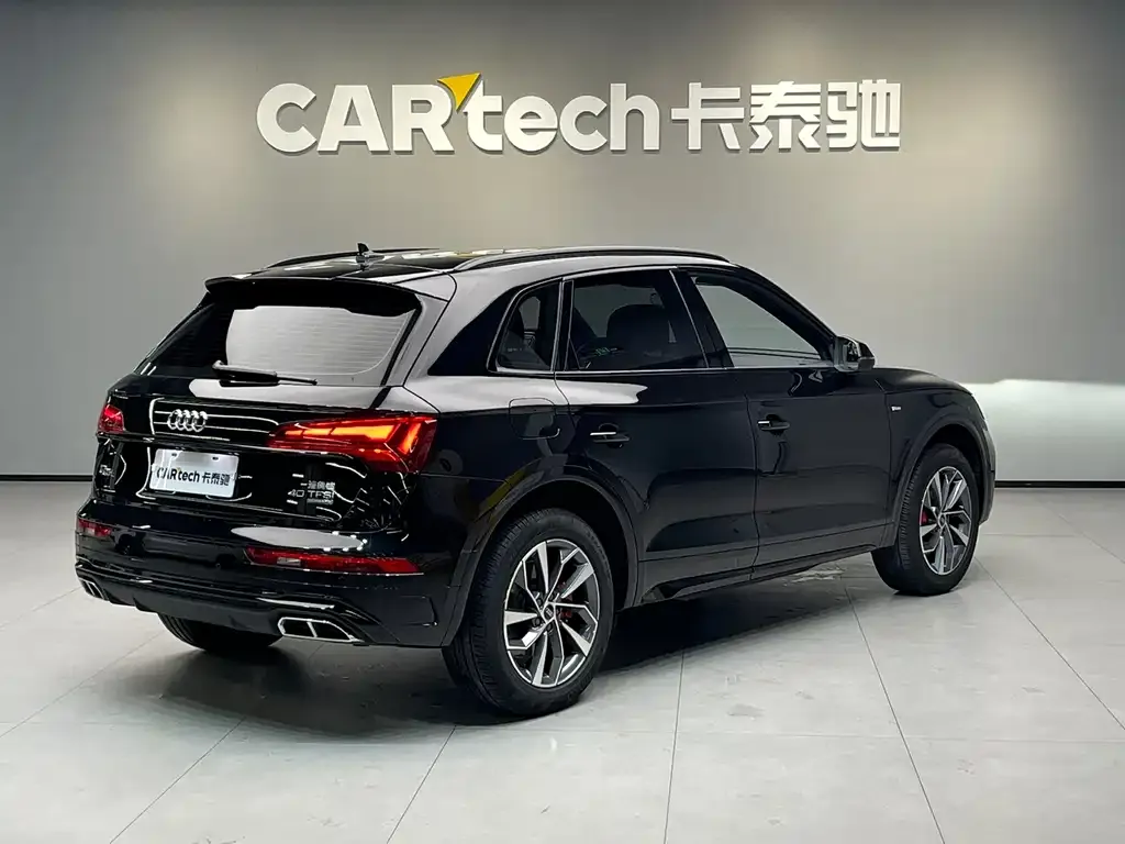 Audi Q5L — фото 5