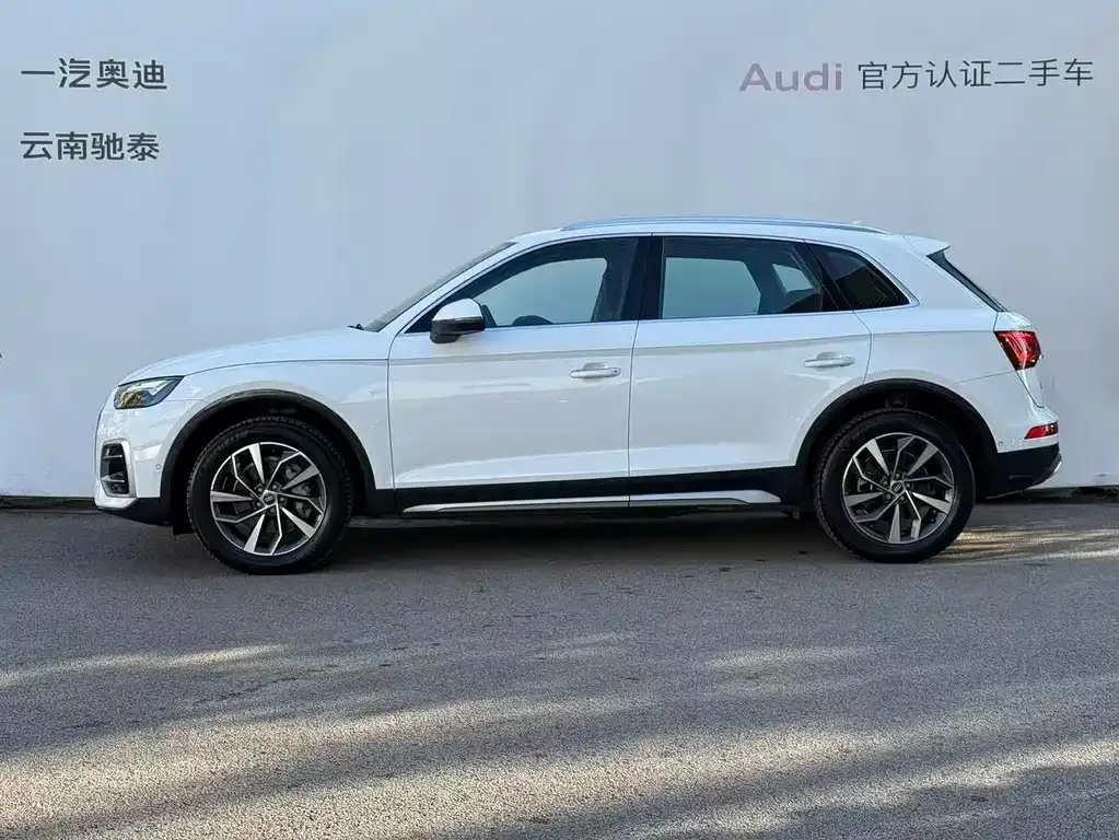 Audi Q5L — фото 6
