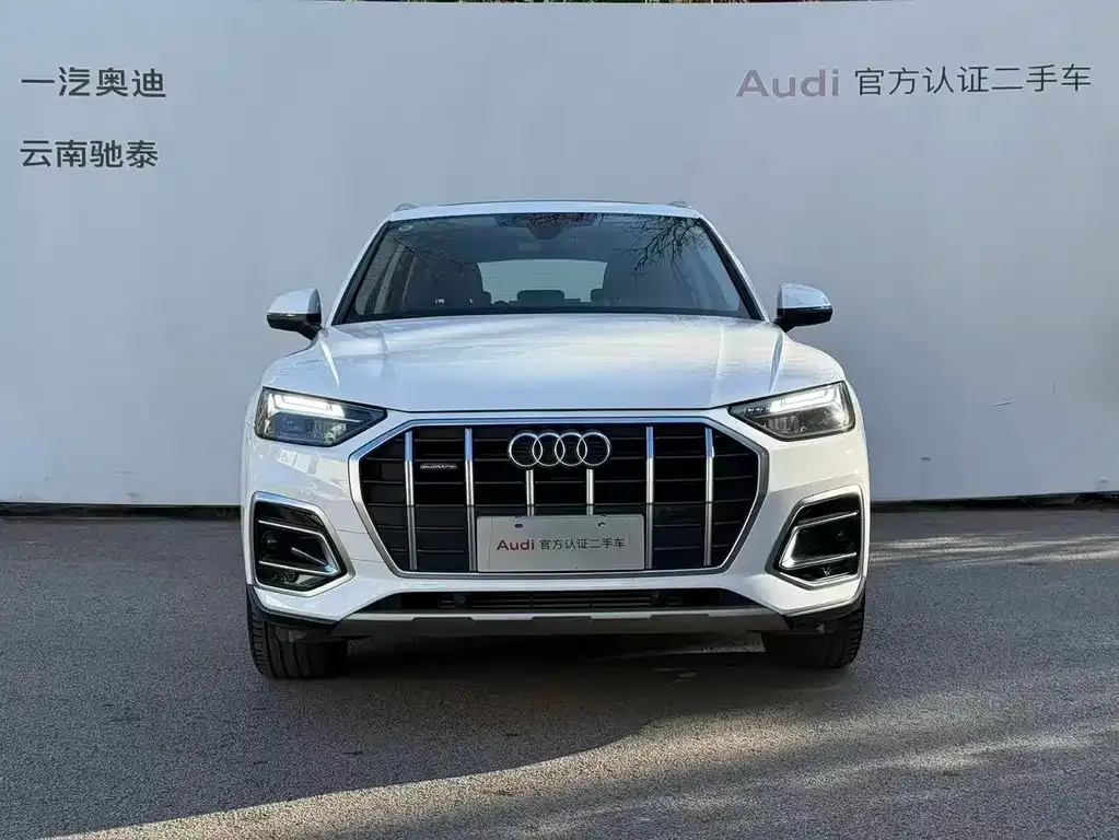 Audi Q5L — фото 10