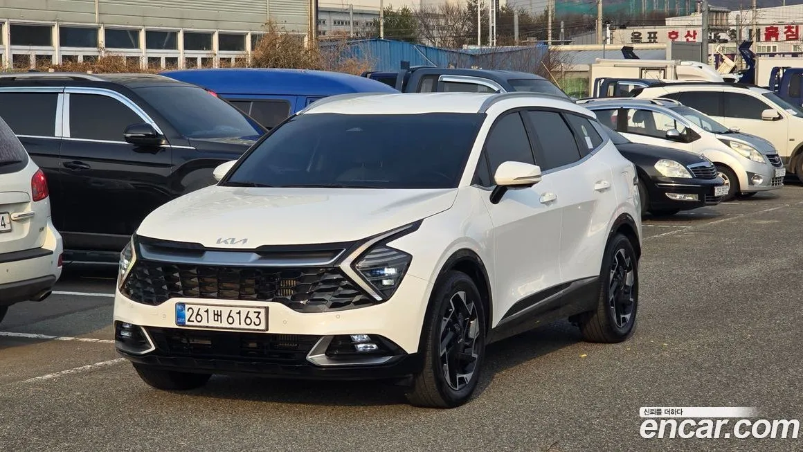 Kia Sportage — фото 1