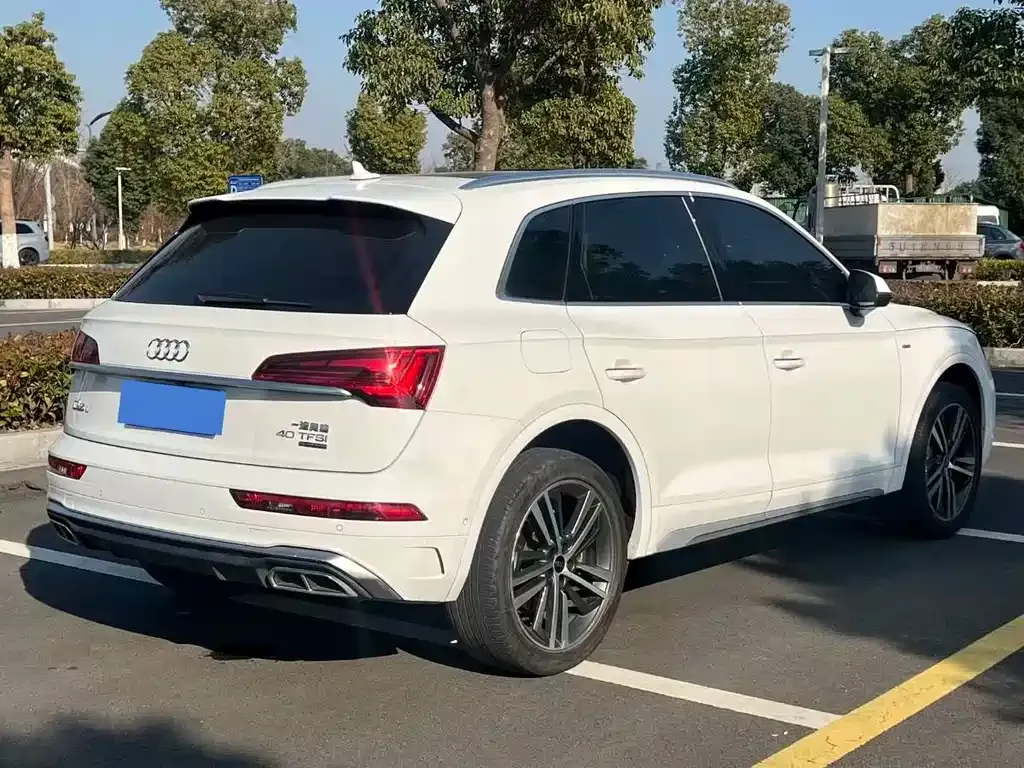 Audi Q5L — фото 7