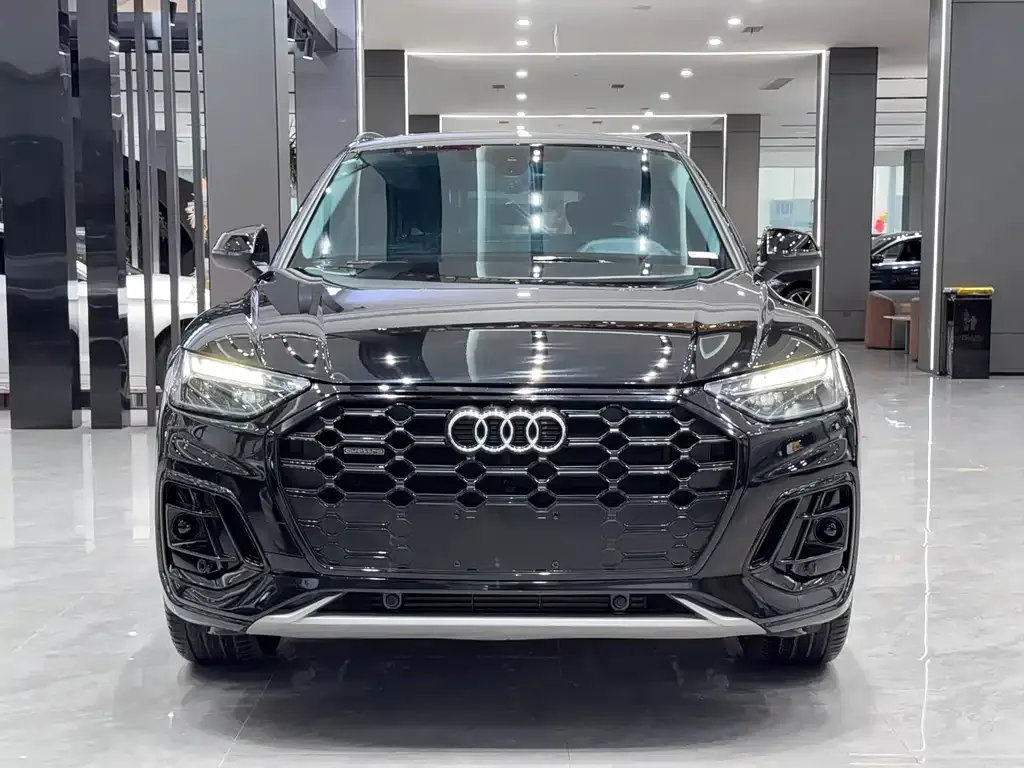 Audi Q5L — фото 9
