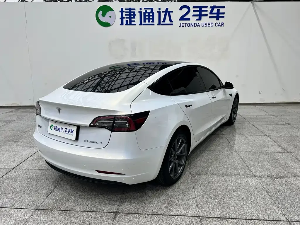 Tesla Model 3 — фото 10