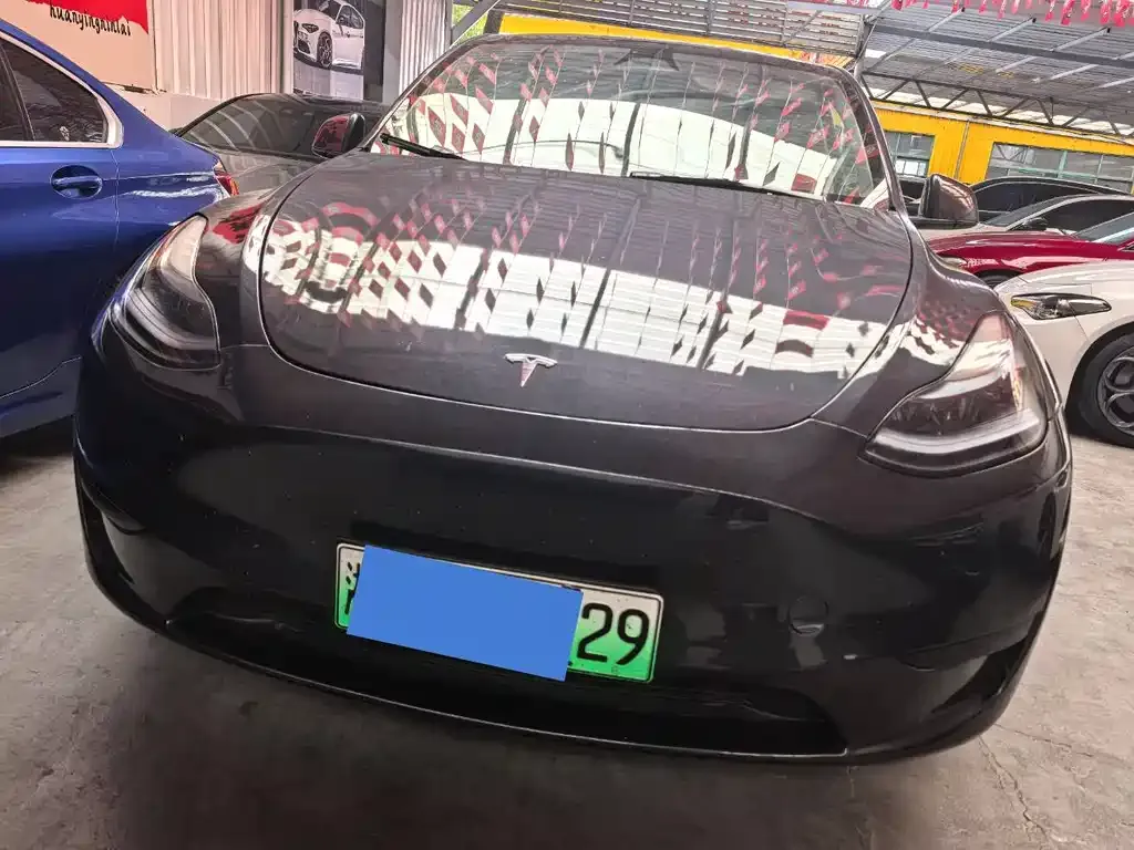 Tesla Model Y — фото 10