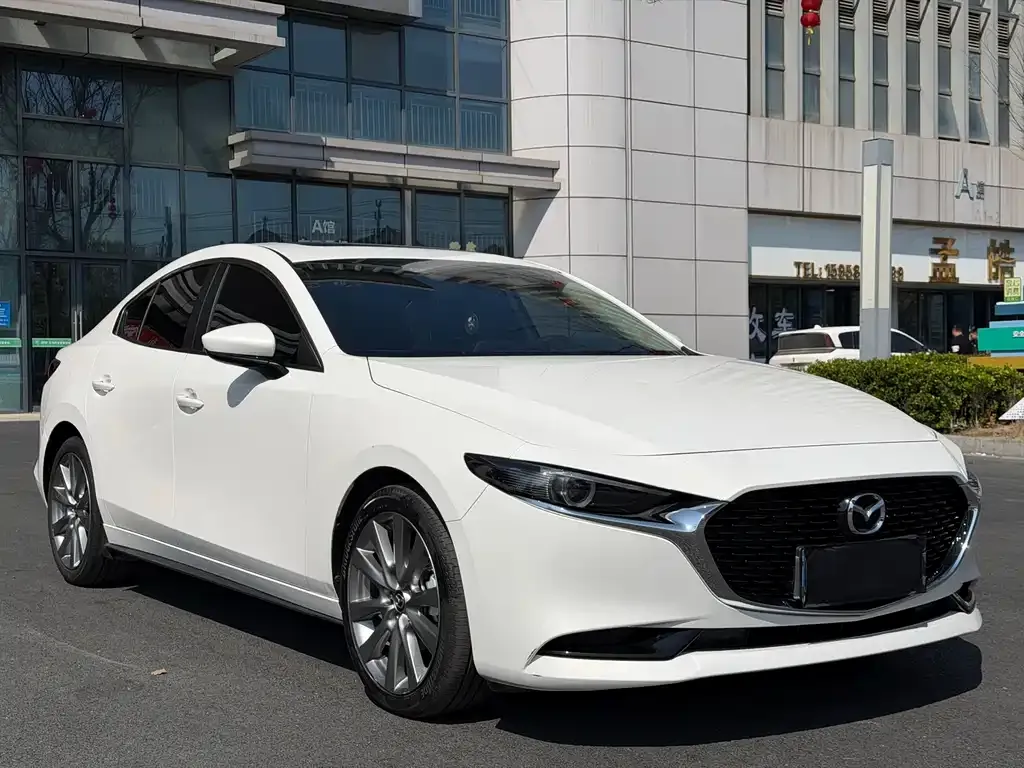 Mazda 3 Axela — фото 1
