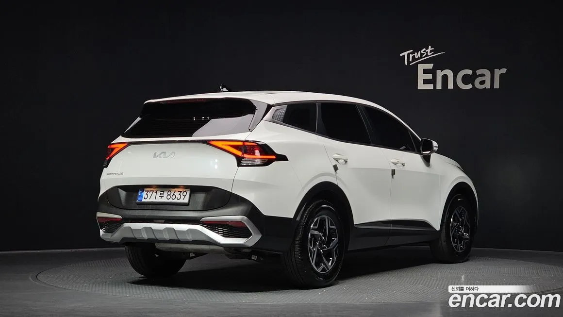 Kia Sportage — фото 8