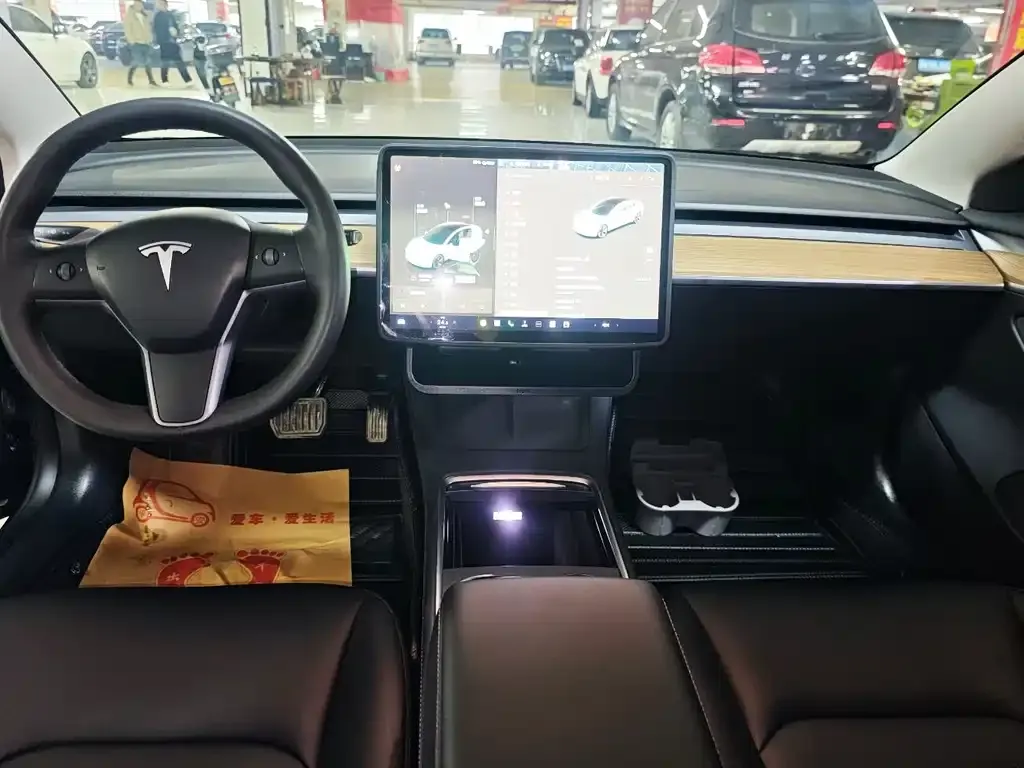 Tesla Model 3 — фото 9
