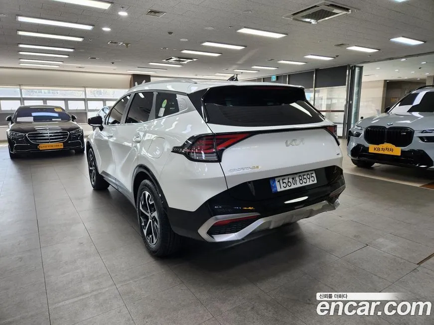 Kia Sportage — фото 10