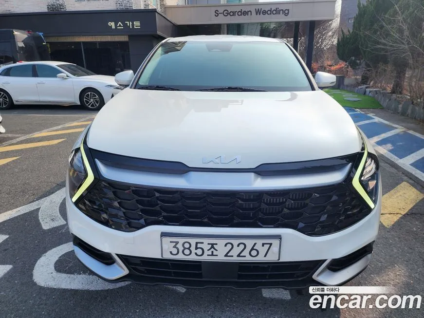 Kia Sportage — фото 1