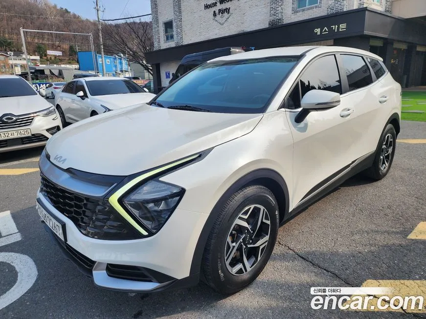 Kia Sportage — фото 7