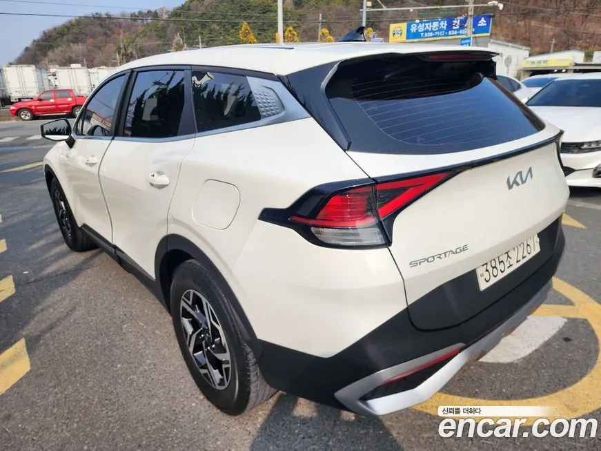 Kia Sportage — фото 9