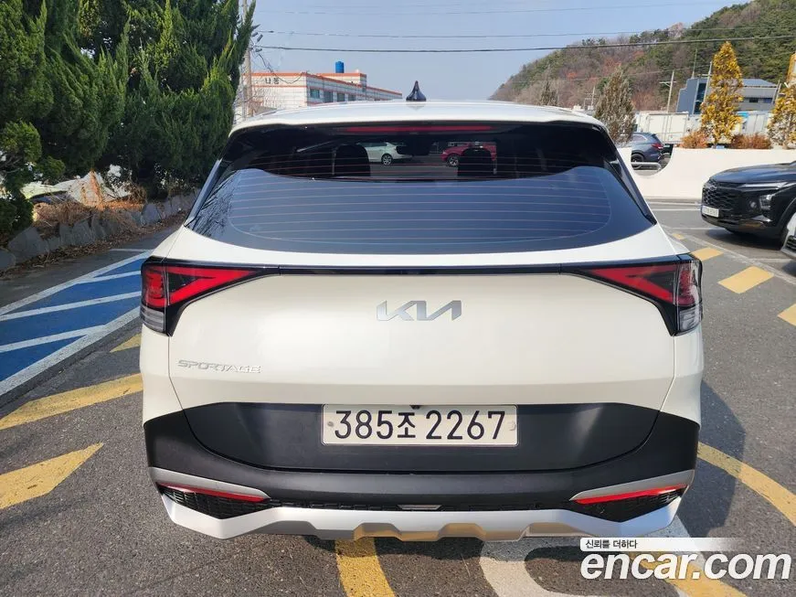 Kia Sportage — фото 10