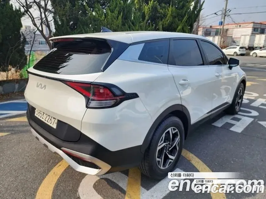 Kia Sportage — фото 5