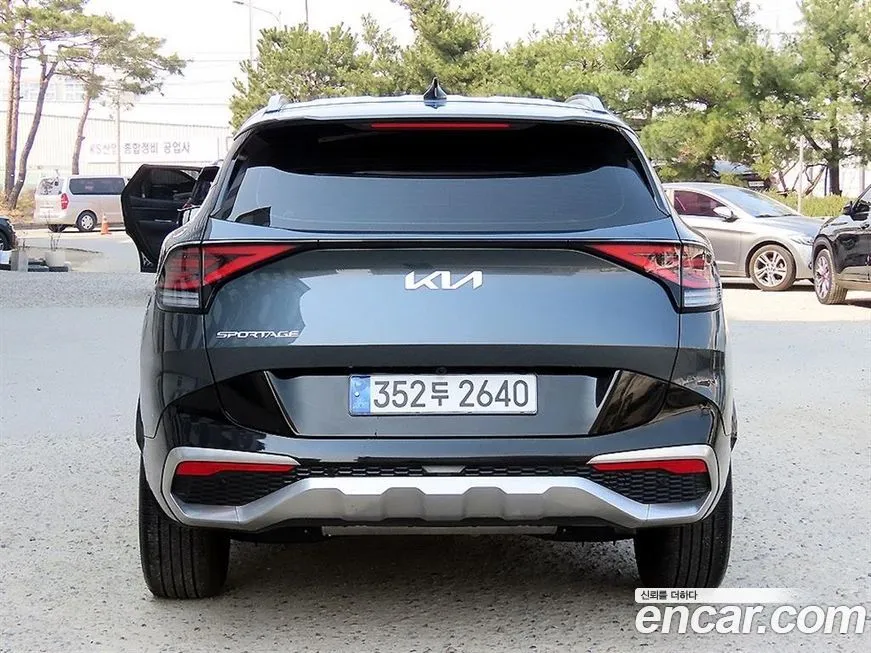 Kia Sportage — фото 10