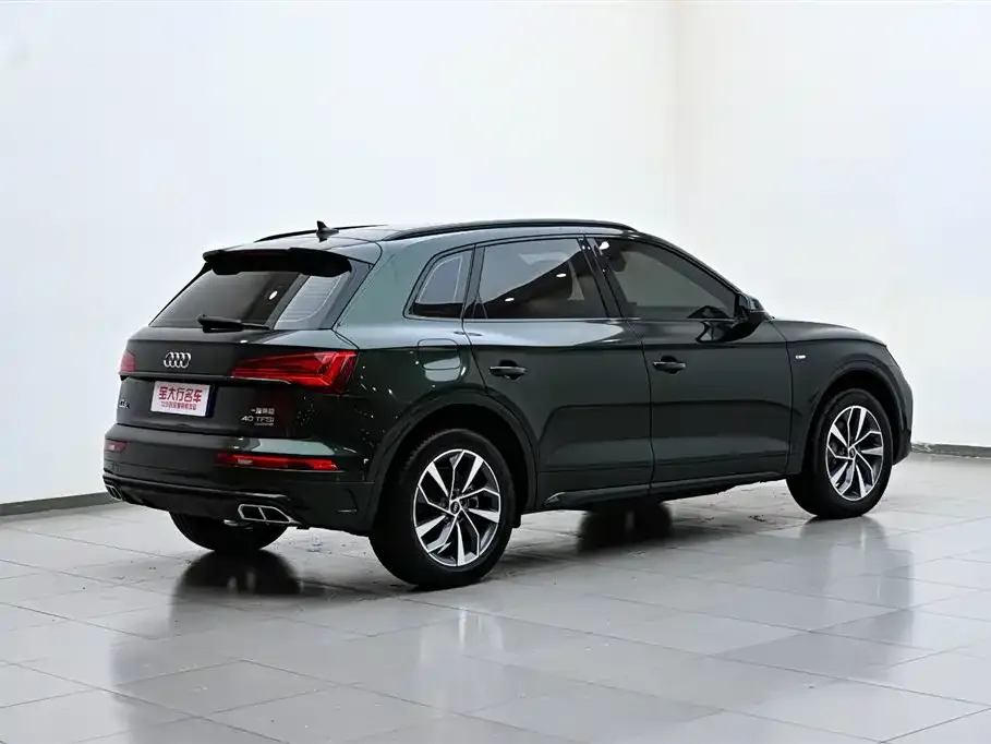 Audi Q5L — фото 6