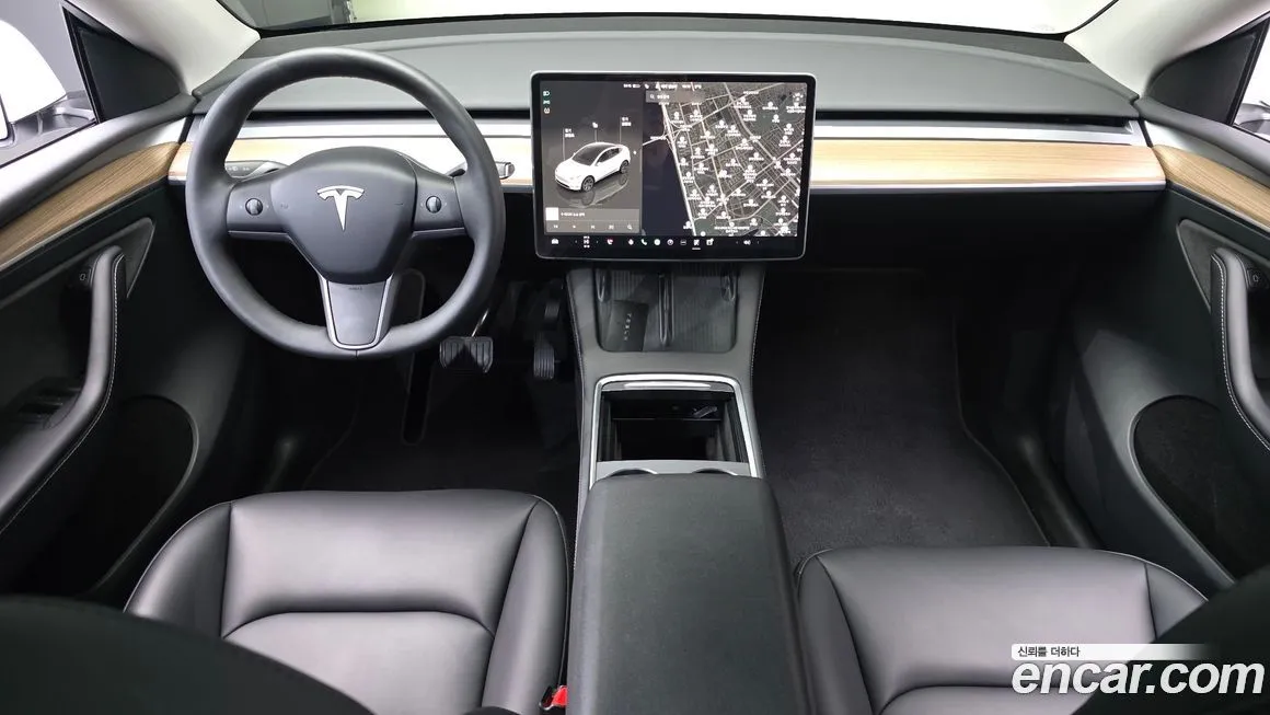 Tesla Model Y — фото 10