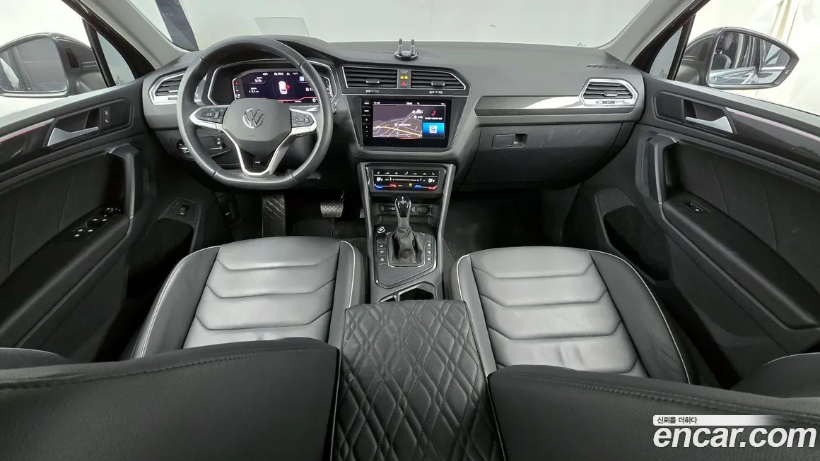 Volkswagen Tiguan — фото 10
