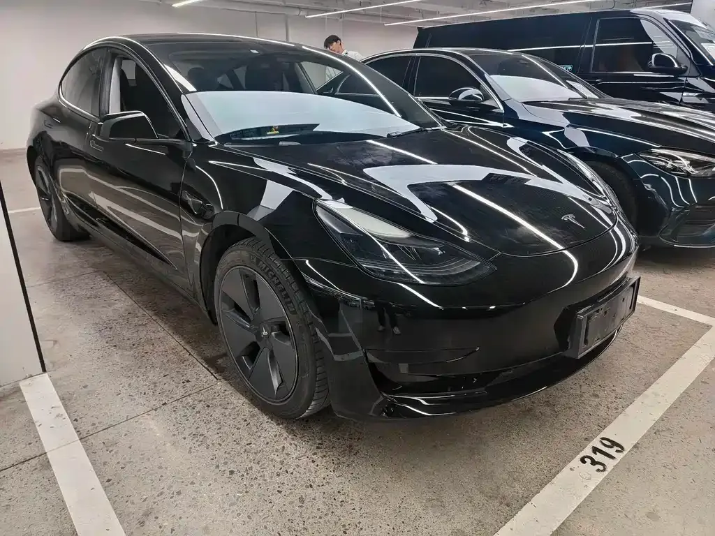 Tesla Model 3 — фото 9
