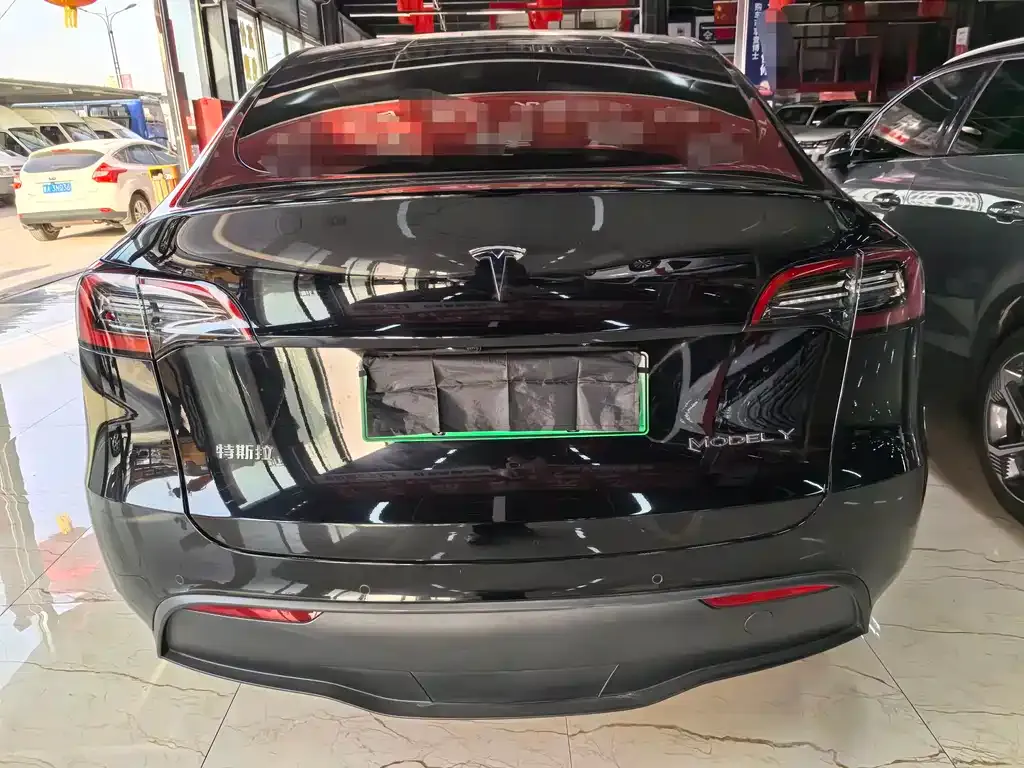 Tesla Model Y — фото 7