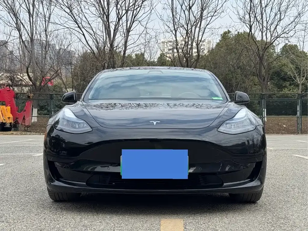Tesla Model 3 — фото 7
