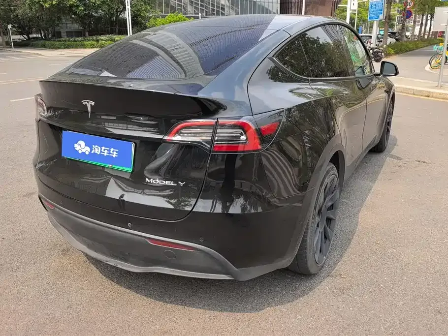 Tesla Model Y — фото 6