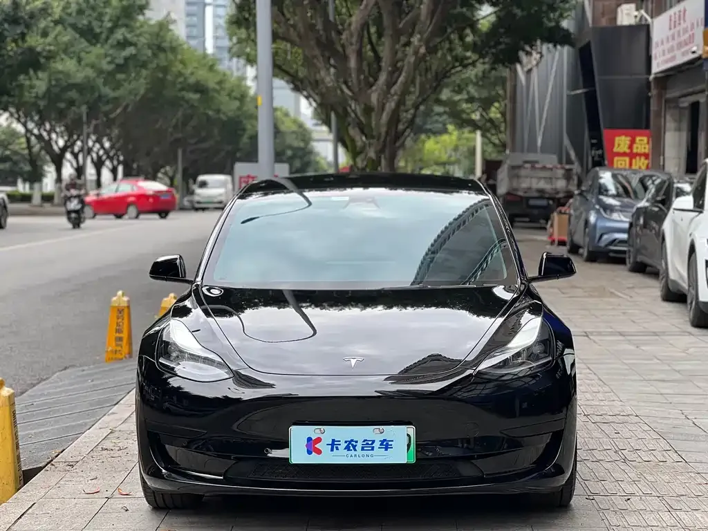 Tesla Model 3 — фото 10