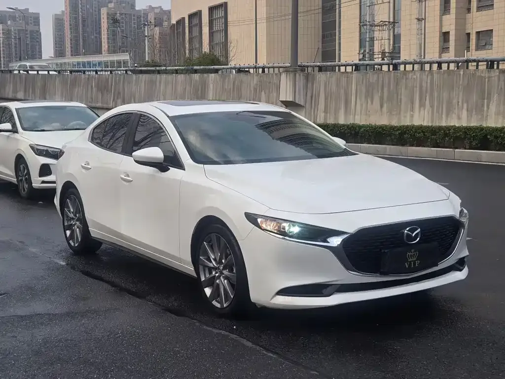 Mazda 3 Axela — фото 4
