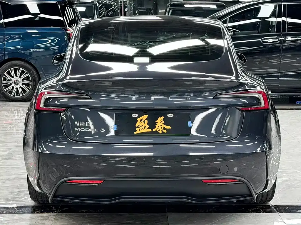 Tesla Model 3 — фото 7