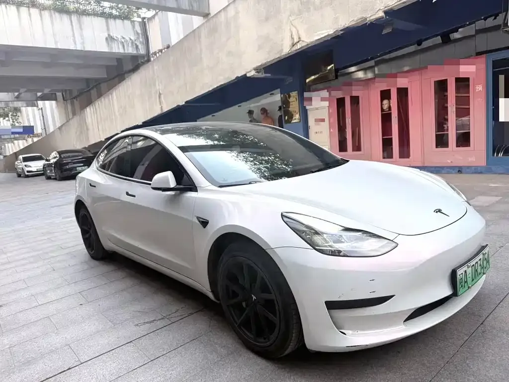Tesla Model 3 — фото 7