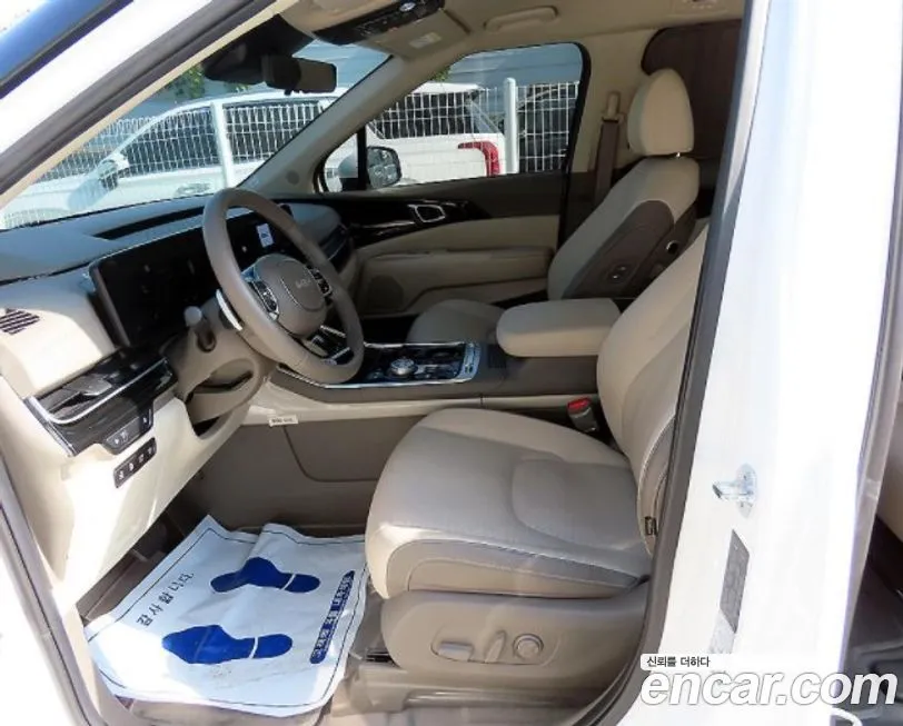 Kia Carnival — фото 10