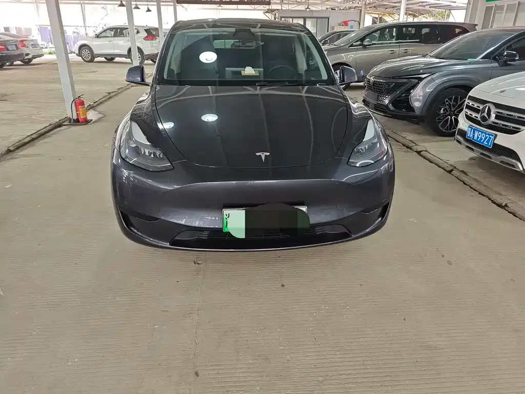 Tesla Model Y — фото 10