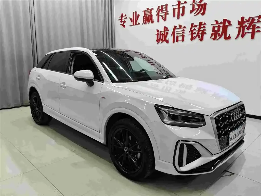 Audi Q2L — фото 3