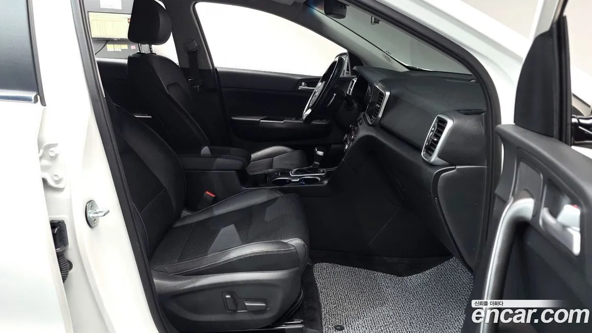 Kia Sportage — фото 10