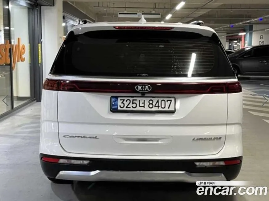 Kia Carnival — фото 10