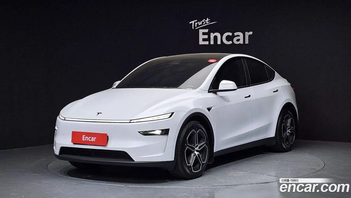 Tesla Model Y — фото 1