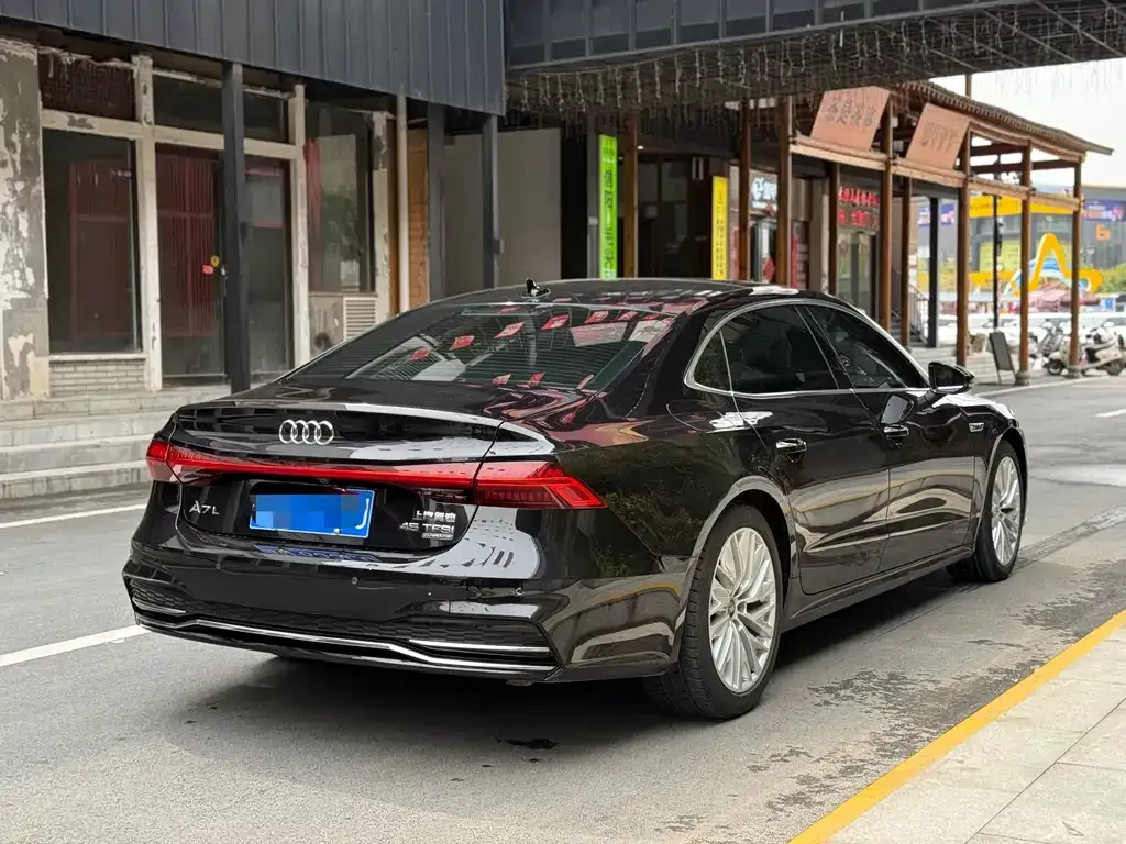 Audi A7L — фото 10