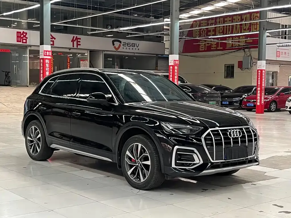 Audi Q5L — фото 10