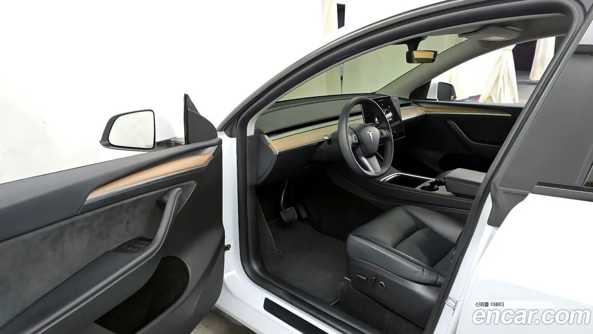 Tesla Model Y — фото 7