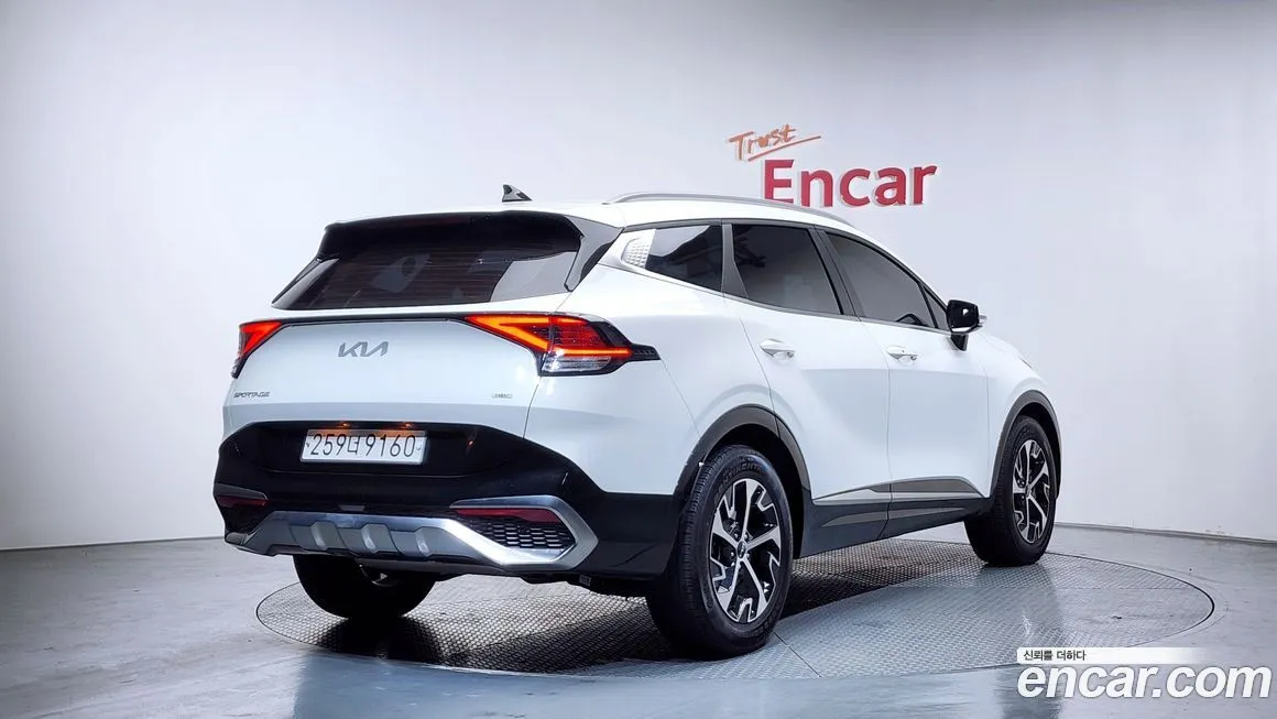 Kia Sportage — фото 9