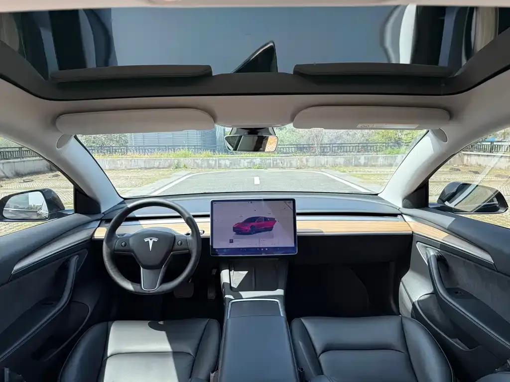 Tesla Model 3 — фото 10