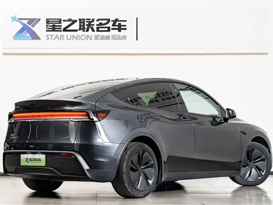 Tesla Model Y — фото 7