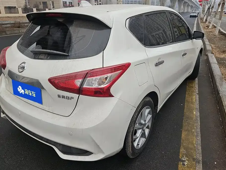Nissan Tiida — фото 2